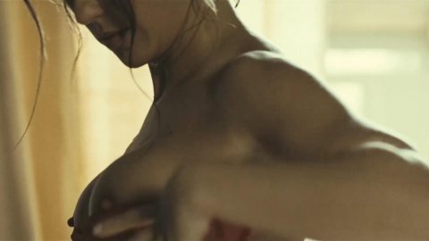 Marta Etura - Nude Breasts in Sleep Tight (2011)